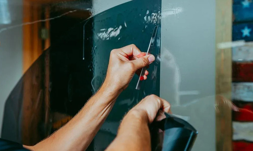 Trimming tint to fit the window